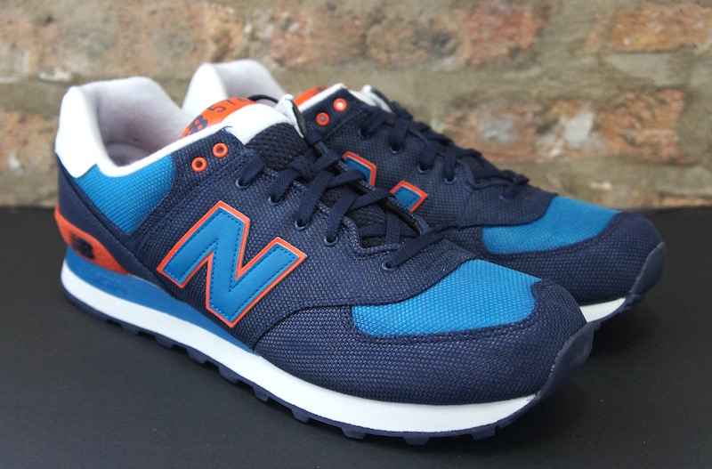 new balance 574 navy orange