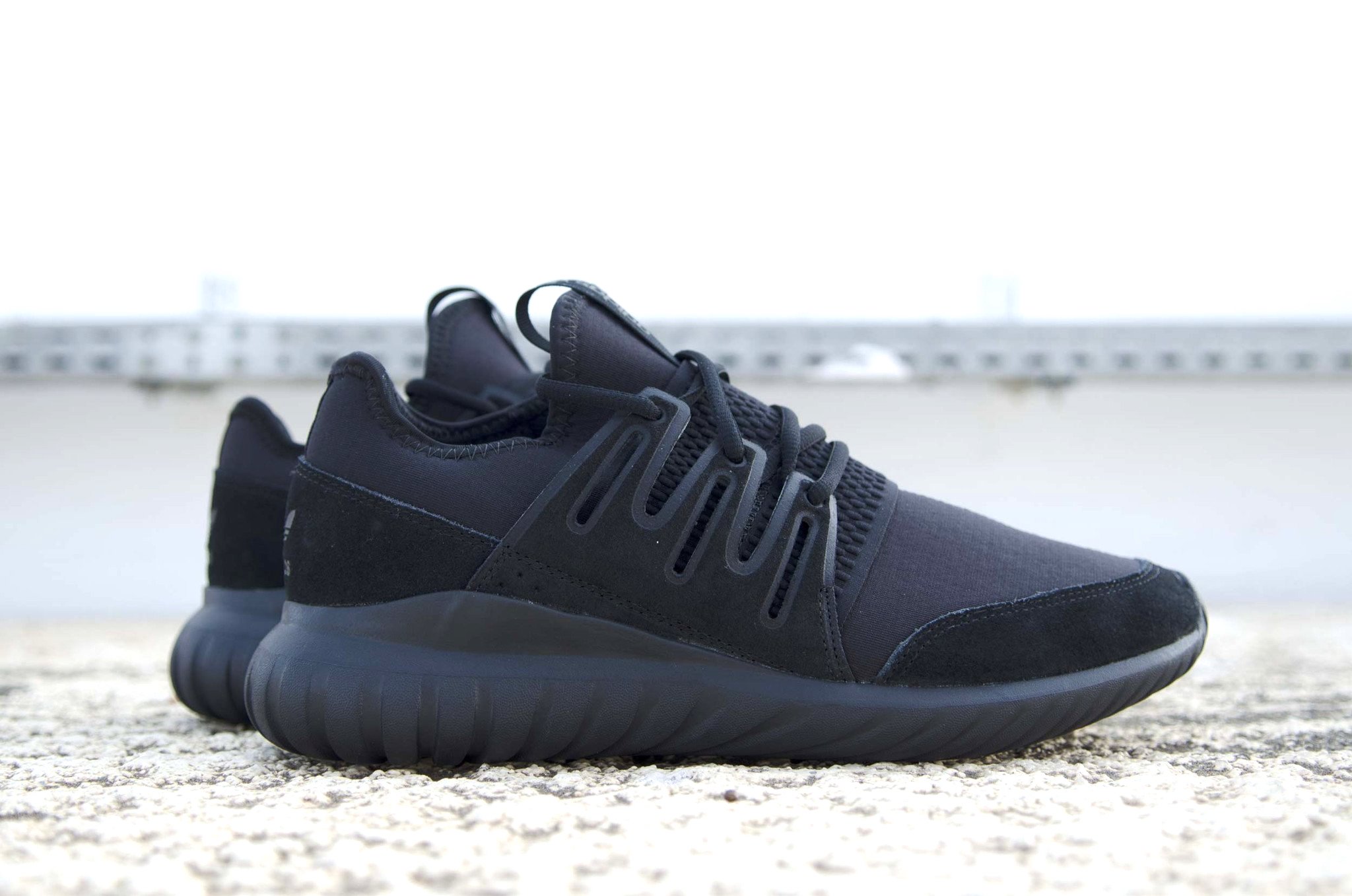 adidas tubular radial triple black