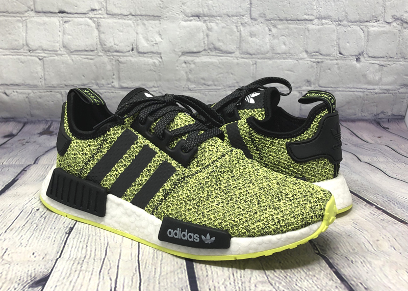 nmd r1 black and yellow