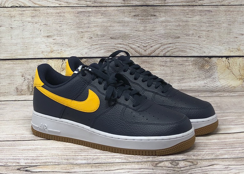 navy and gold nike shoes