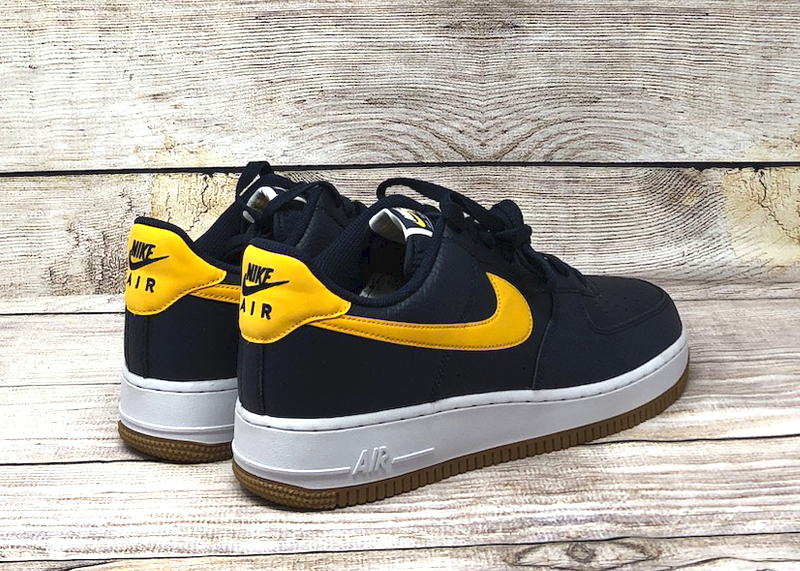navy blue and yellow air force ones high top